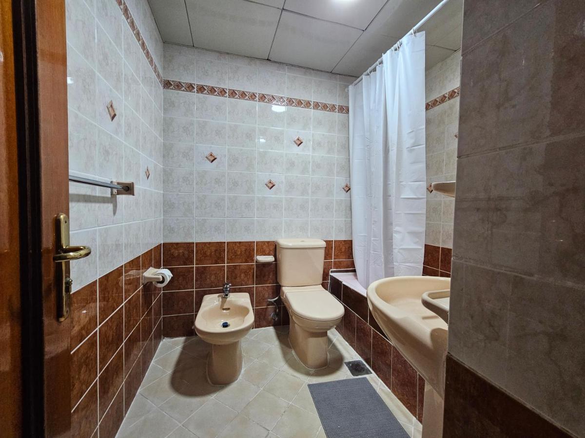 Oasis Hostel Abu Dhabi Buitenkant foto